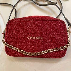 Chanel cosmetic bag with added chain